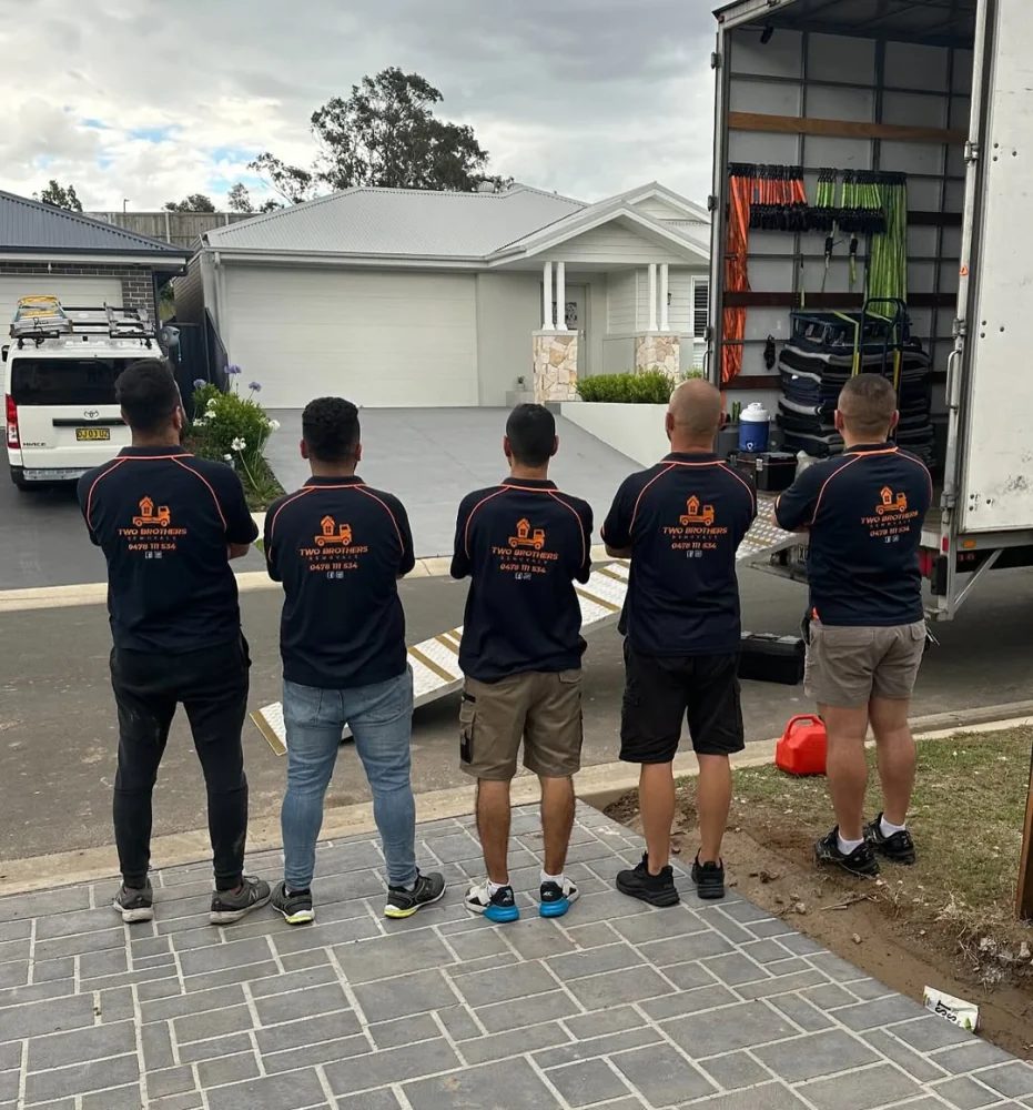 Our crew at the back of the truck ready to load