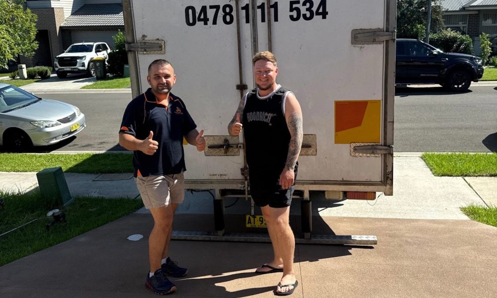 Two Brothers Removals crew loading up the truck ramp on a Sydney move